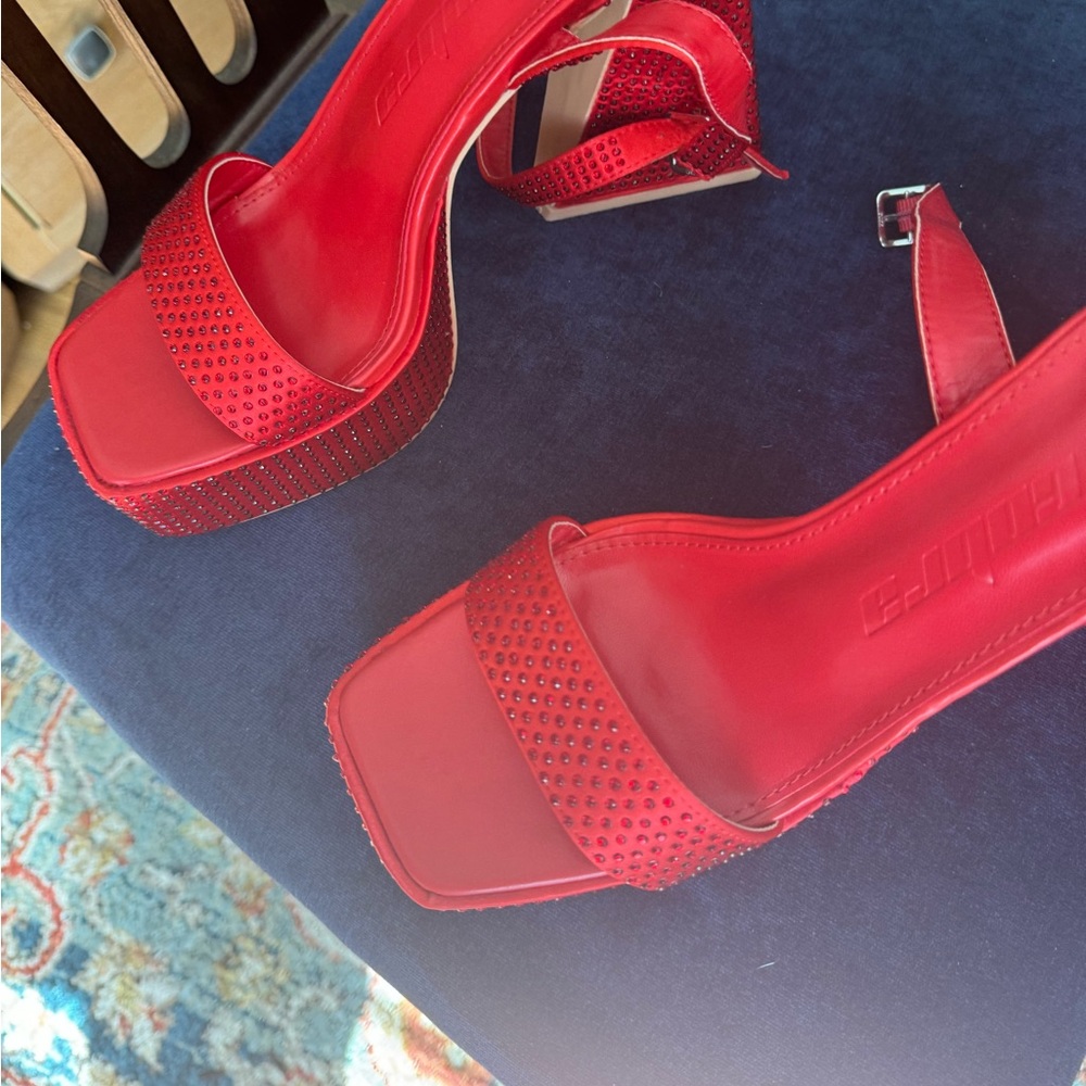 Strappy Red Rhinestone studded chunky heels with pep toe.